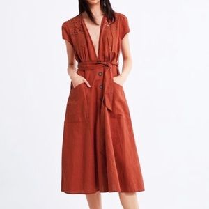 Zara embroidered linen terracotta dress with plunge neck and pockets.